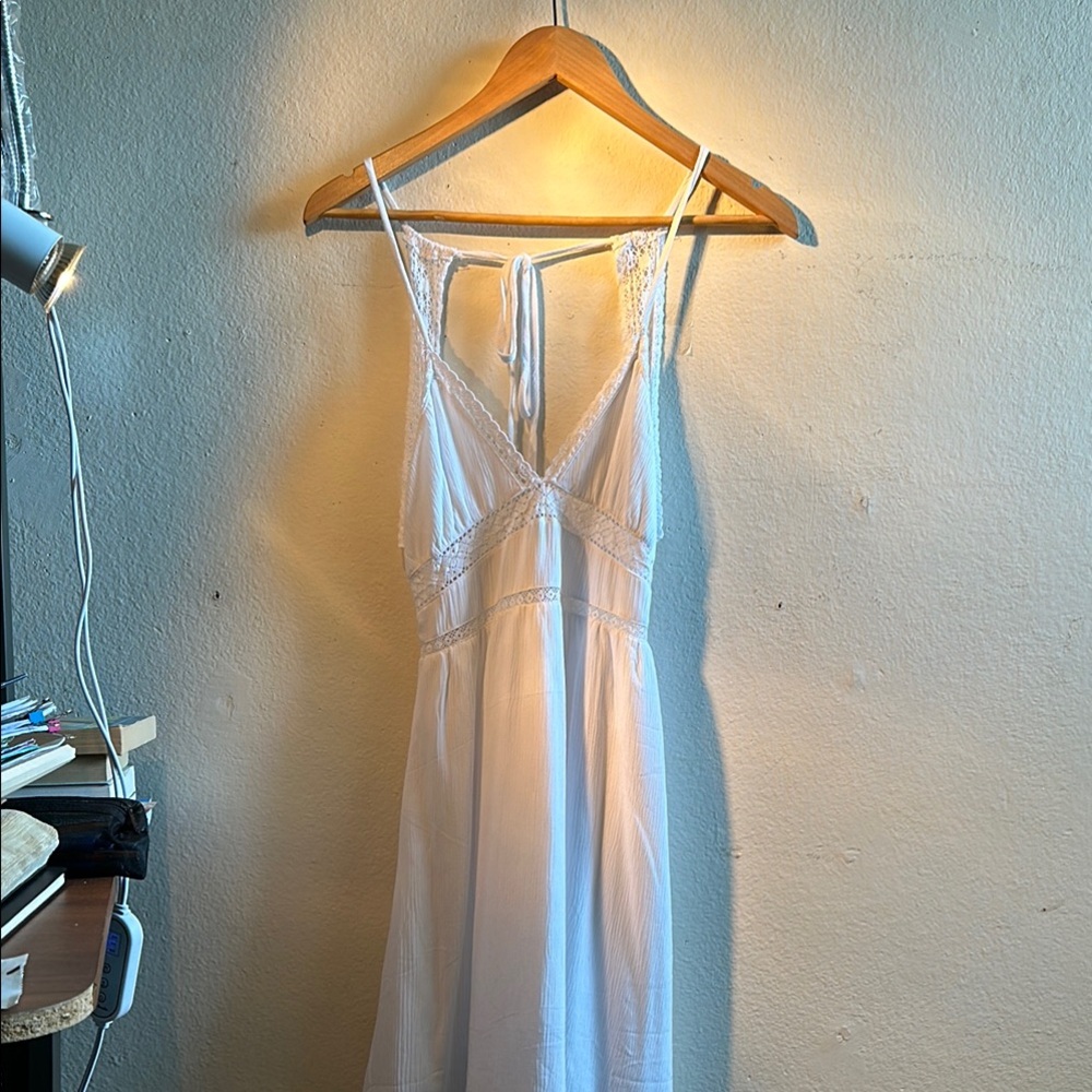 Stylish White Lace-Trimmed Dress